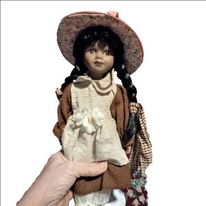 Porcelain doll, beautiful colonial era doll with hat